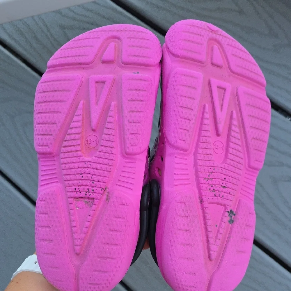 Pink and Black Slippers with Playful Design